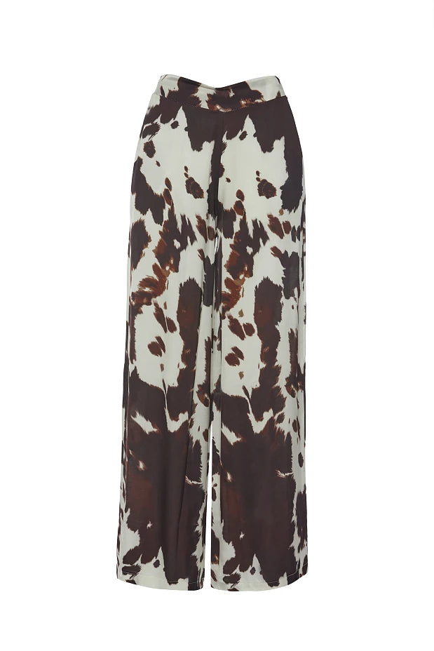 High-waisted cow print pants