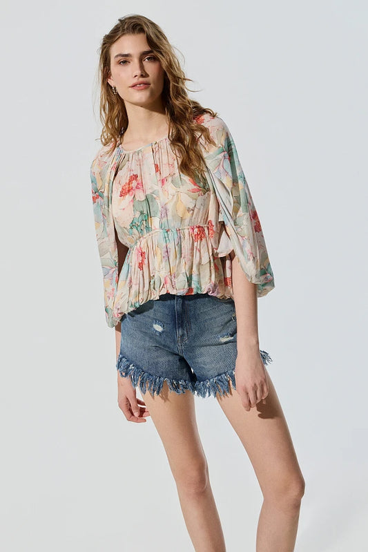 Blusa estilo capa con estampado floral