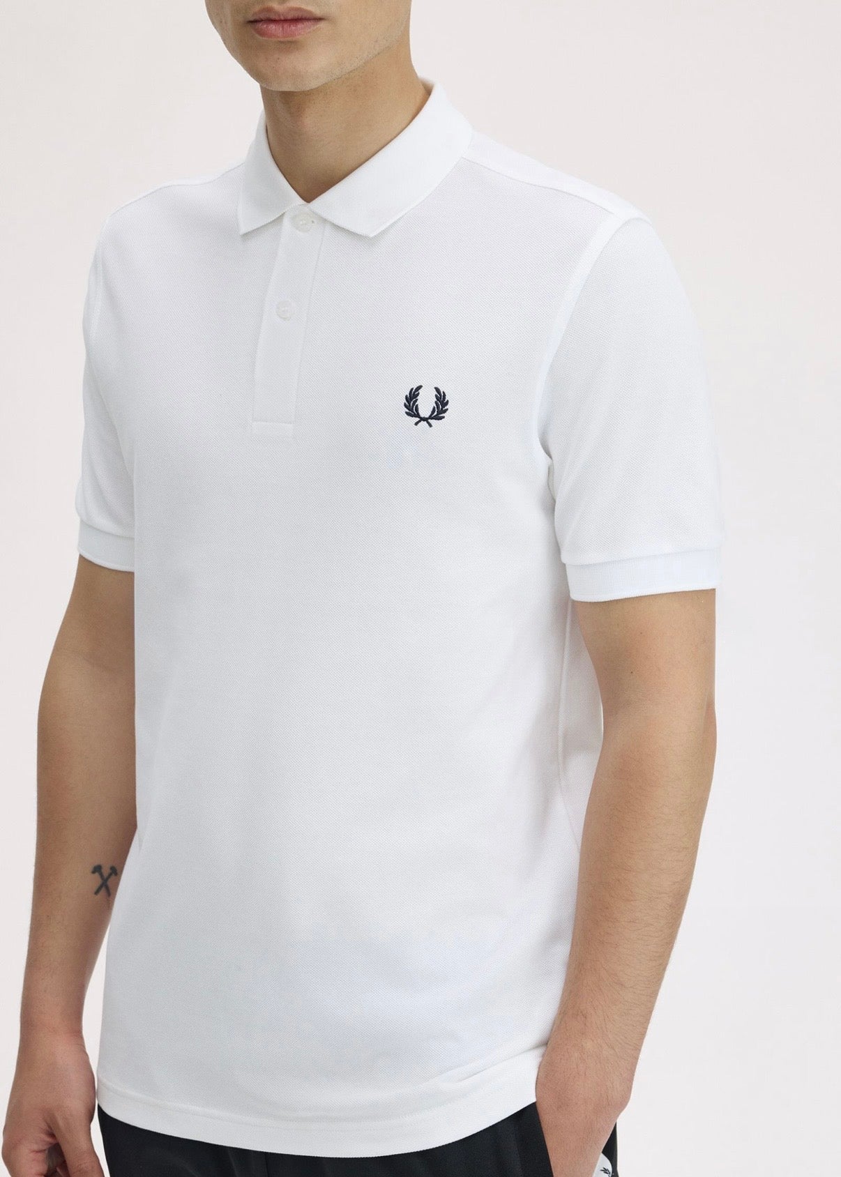 THE FRED PERRY POLO