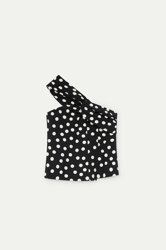 Top asimétrico con estampado de puntos negro y blanco