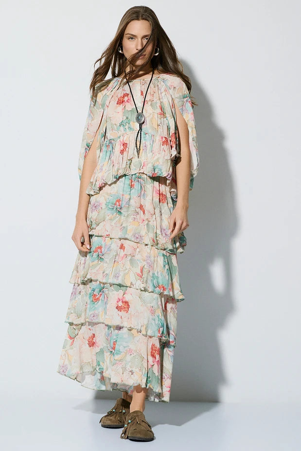 Falda midi floral con volantes