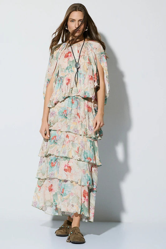 Falda midi floral con volantes