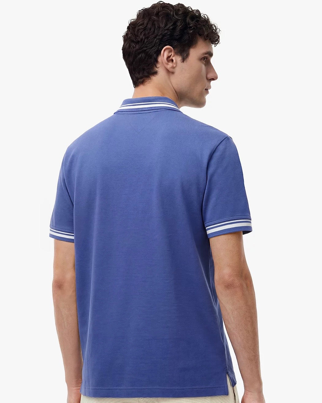 Polo ribeteado de corte regular con logo de Tommy