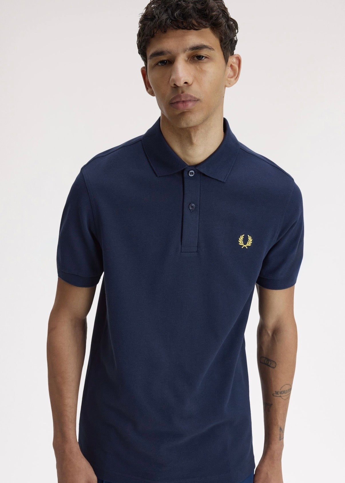 THE FRED PERRY POLO