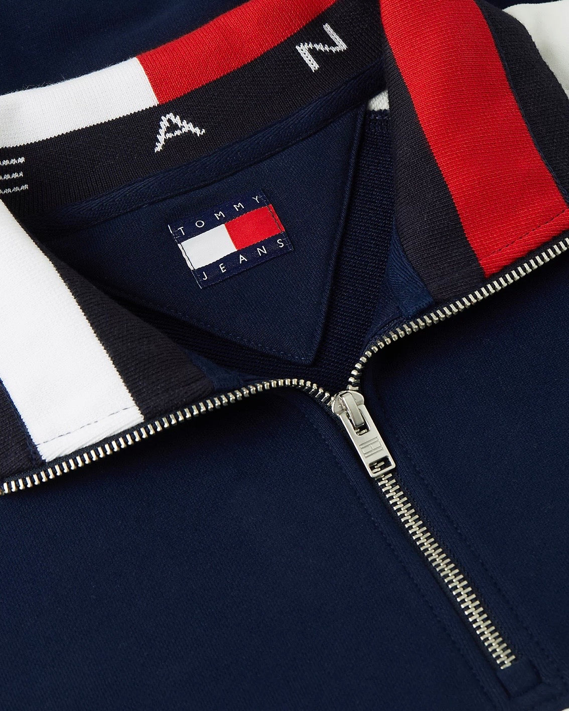 Sudadera color block con cremallera de un cuarto